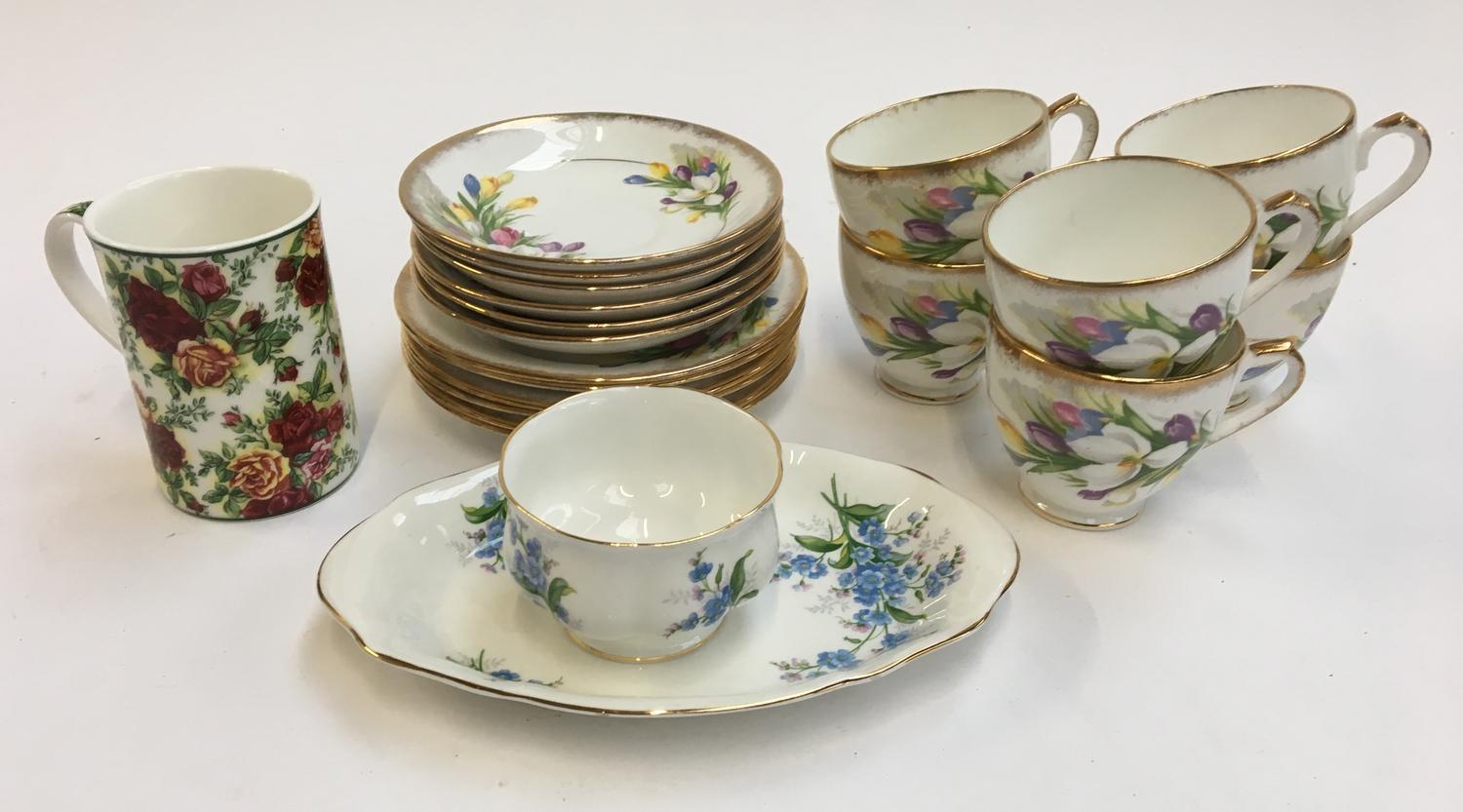 An Imperial Fine Bone China part tea set, six cups, six saucers and six plates, together with a