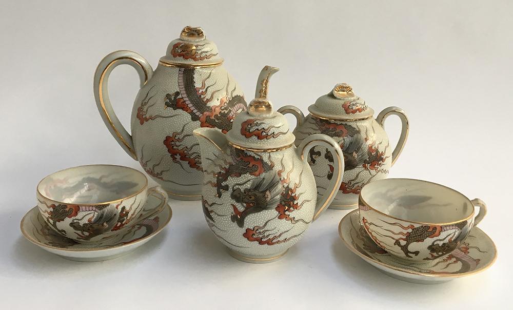 A Japanese fine teaset, to include teapot, milk jug, sugar bowl, and two cups and saucers
