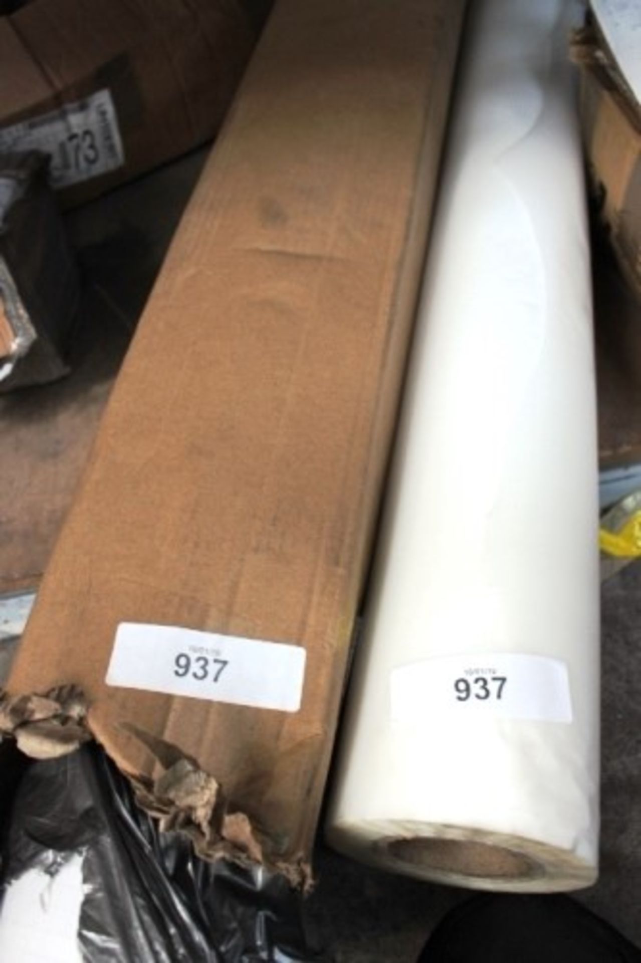 A roll of matte cold lamination film 005 1524mm x 50m, together with an unidentified roll of plastic