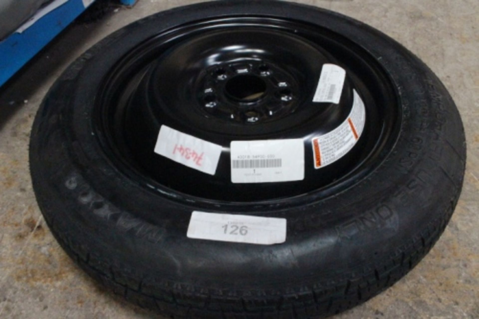 A space saving tyre, 5 stud, size T135/90D16 - New (ESB7)