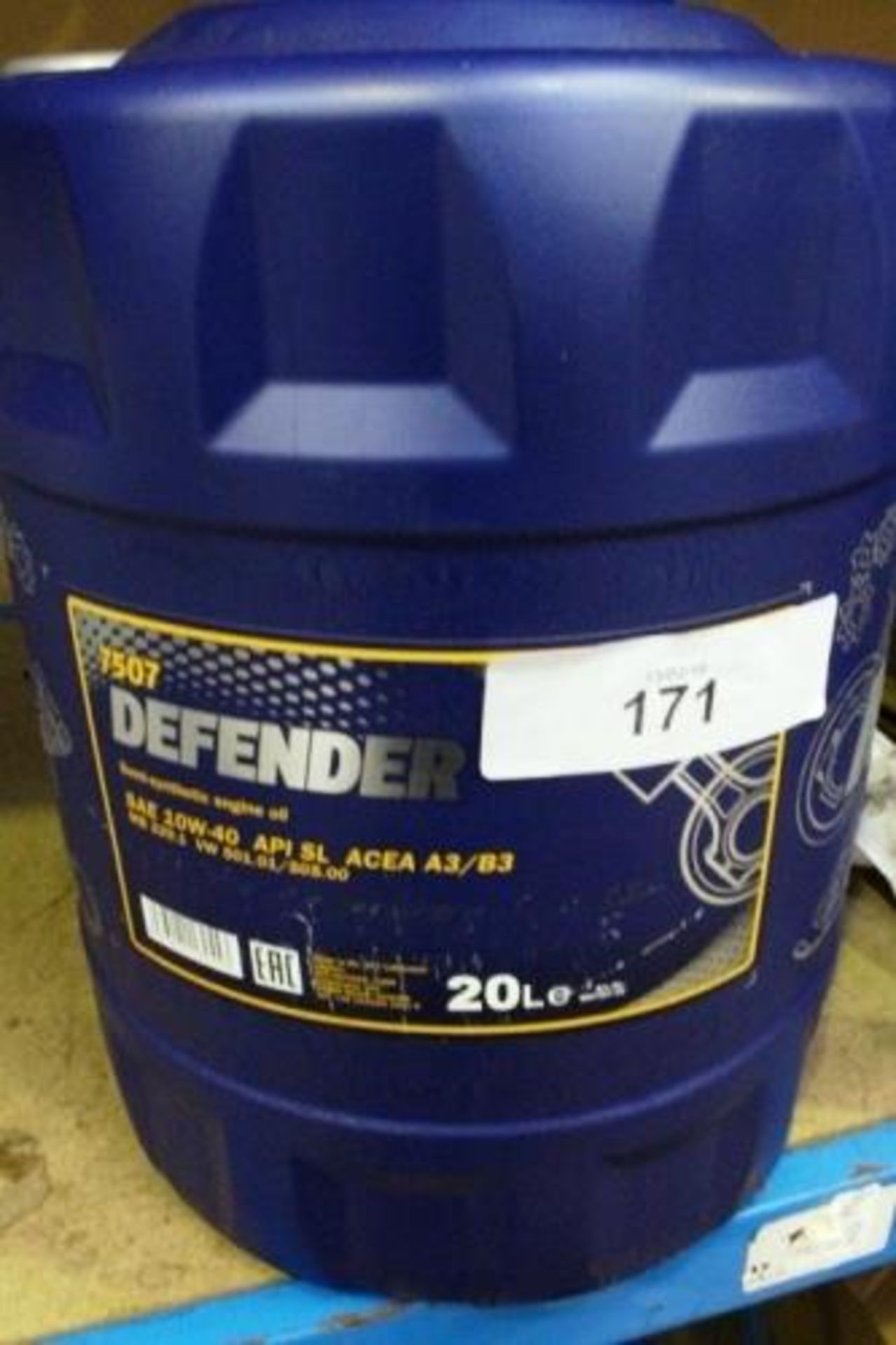 A 20ltr bottle of Manol Defender engine oil, Ref: 10W-40 API SL (ESB11)