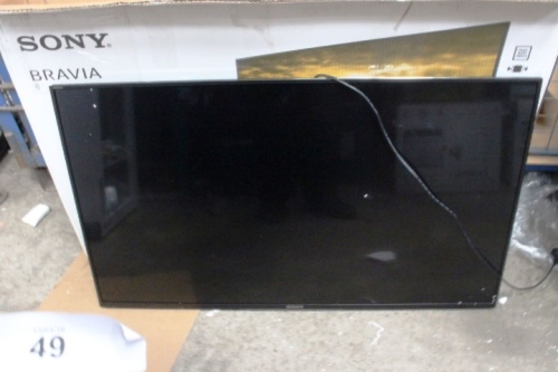 A Sony Bravia 43" TV, XD83, screen only, no legs or accessories, faulty power supply module, does
