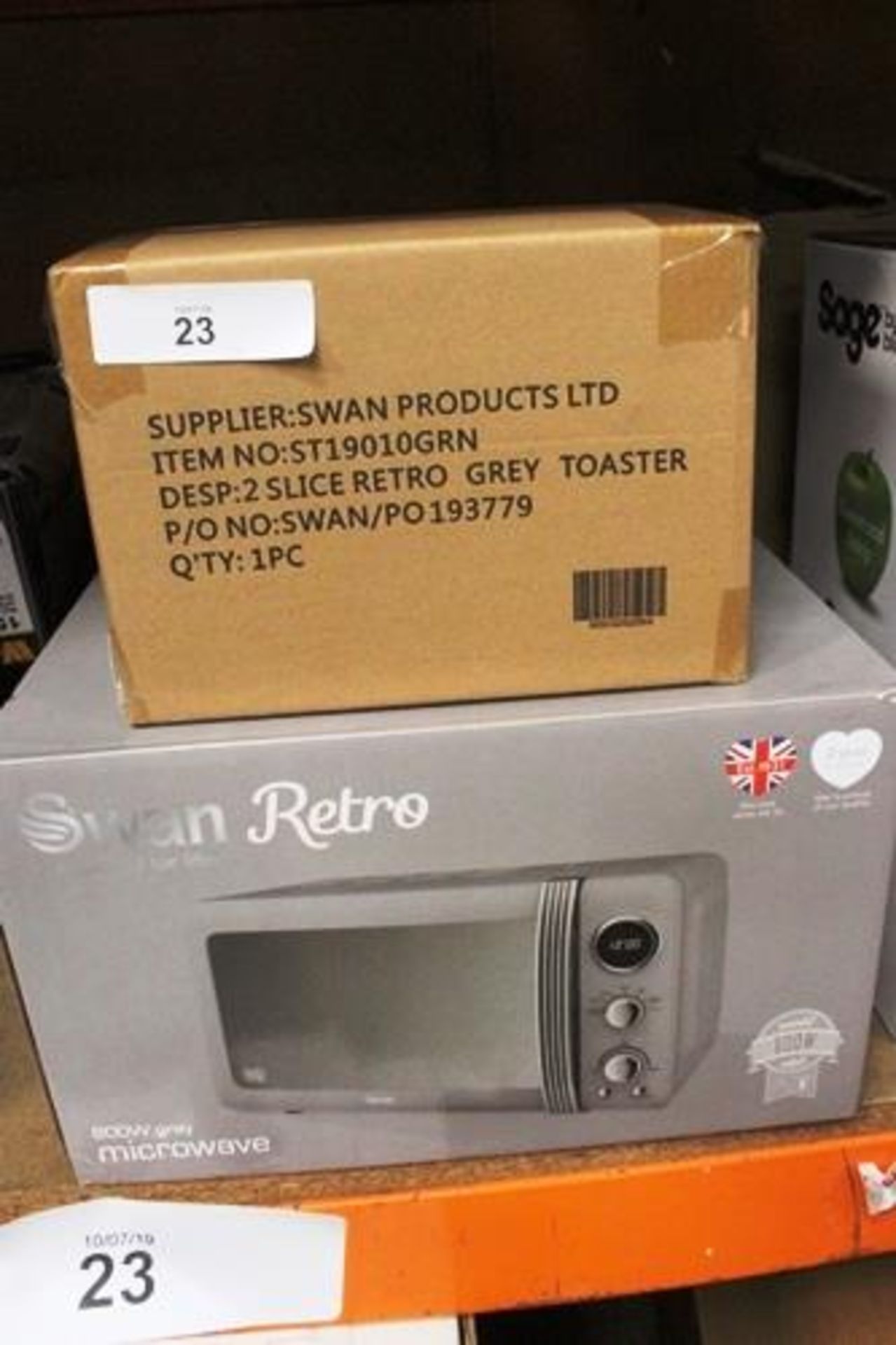 A Swan retro grey microwave, 800W, model SM22030GRN, together with a Swan 2 slice toaster, PO 193779