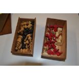 Two wooden boxes of chess pieces to include ivory