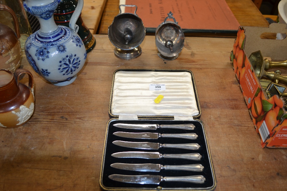 A cased set of six silver handled fruit knives; an