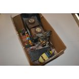 A box containing three model train winding keys; a