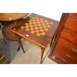 A square topped inlaid games table