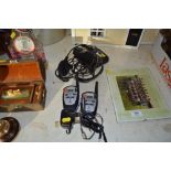 A pair of FM transceivers and a pair of walkie tal