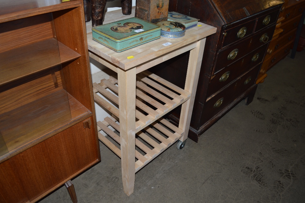 A beech three tier kitchen trolley