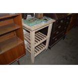 A beech three tier kitchen trolley