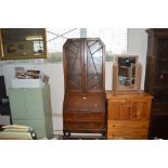 A 1920s/30s oak bureau bookcase fitted two drawers