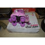 A pair of girls roller skates