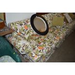 A floral upholstered two seater settee