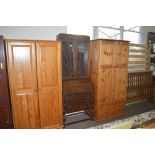 An Art Deco oak bureau bookcase fitted two long dr