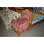 An early 20th Century stripe upholstered deep seat