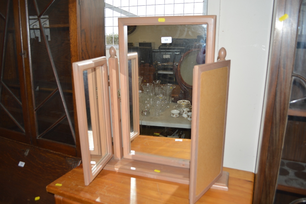 A triptych dressing table mirror