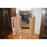 A triptych dressing table mirror