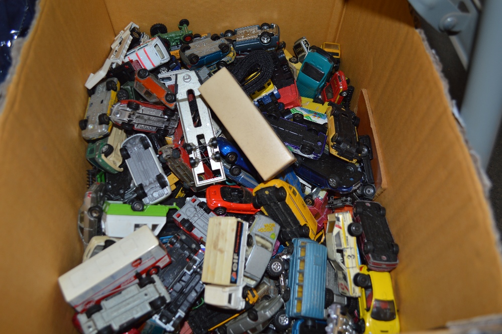 A box of various die cast toys