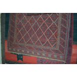 An approx 4" x 3'9" Kazak rug