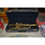 A trumpet in fitted case (132)