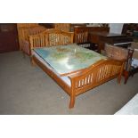 A continental pine bed frame together with a Slient Night mattress