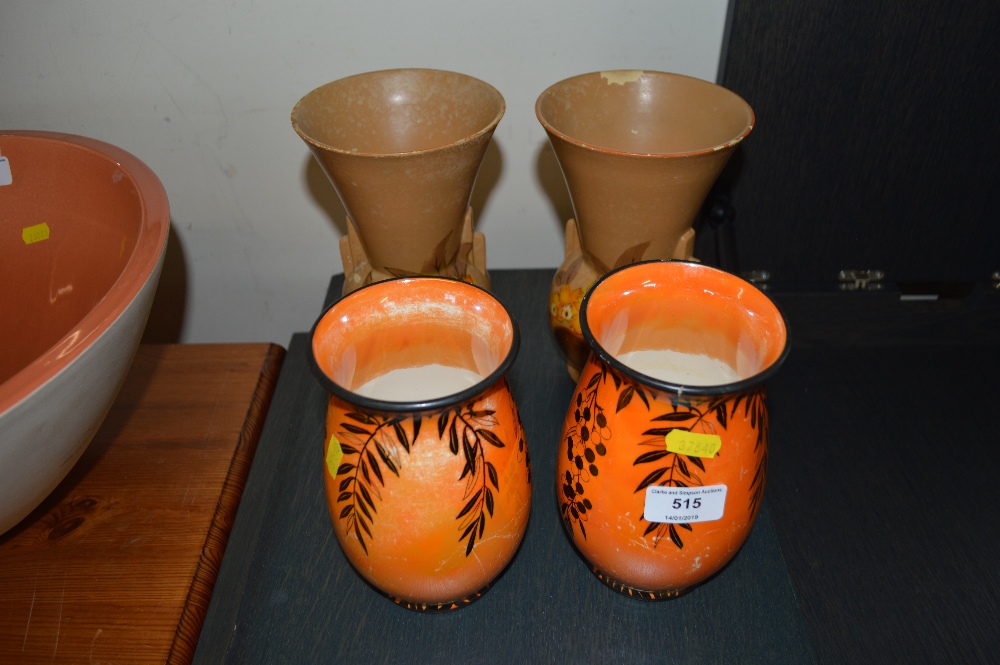 A pair of Art Deco floral decorated vases and a pa