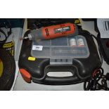 A Black & Decker dremel in fitted case