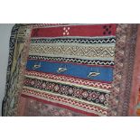 An approx 3" x 1'10" Kashmiri wool rug