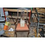 An oak slat back carver chair