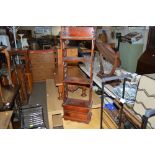 A mahogany narrow bookcase fitted two drawers belo