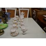 A Queens rose decorated coffee set; and a floral d