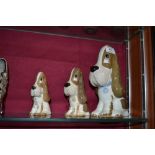 A set of three Szeiler graduating dog ornaments