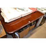 A Victorian style mahogany extending dining table