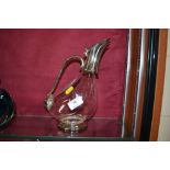 A silver plate mounted and glass claret jug