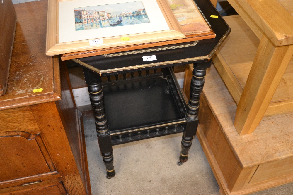 A late Victorian ebonised two tier window table