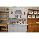 A grey painted and mirrored dresser fitted two dra