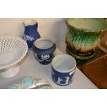 A Wedgwood jasperware jug, vase and biscuit barrel