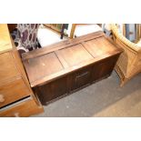 An oak panelled blanket box