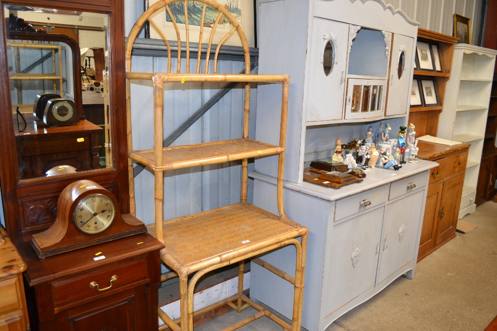 A cane and wicker shelving unit