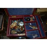 A red leather jewellery box and contents