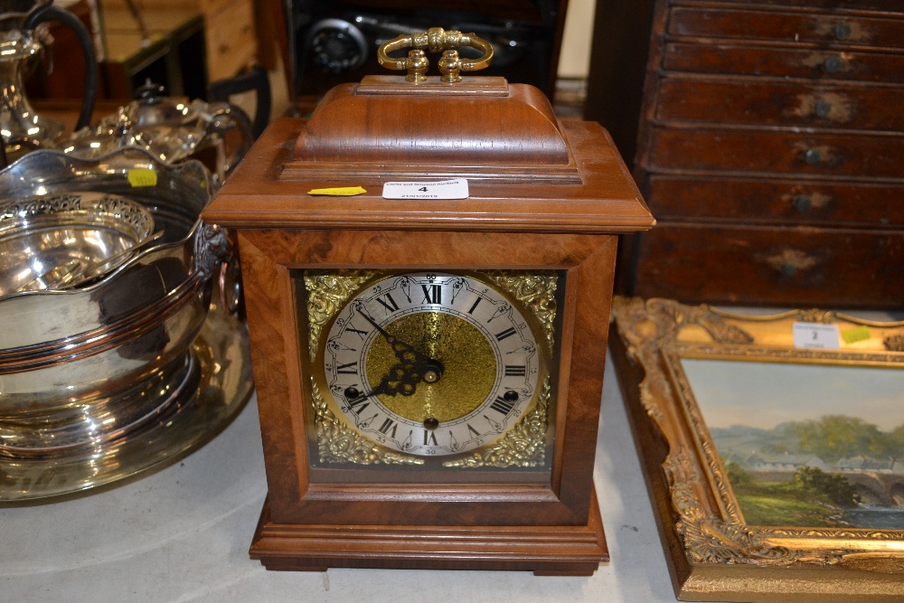 A modern German three hole mantel clock