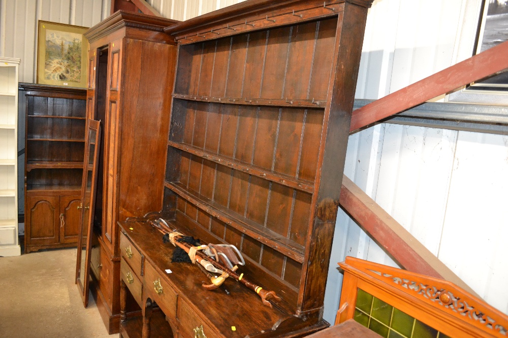 An antique oak dresser fitted five drawers