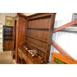 An antique oak dresser fitted five drawers