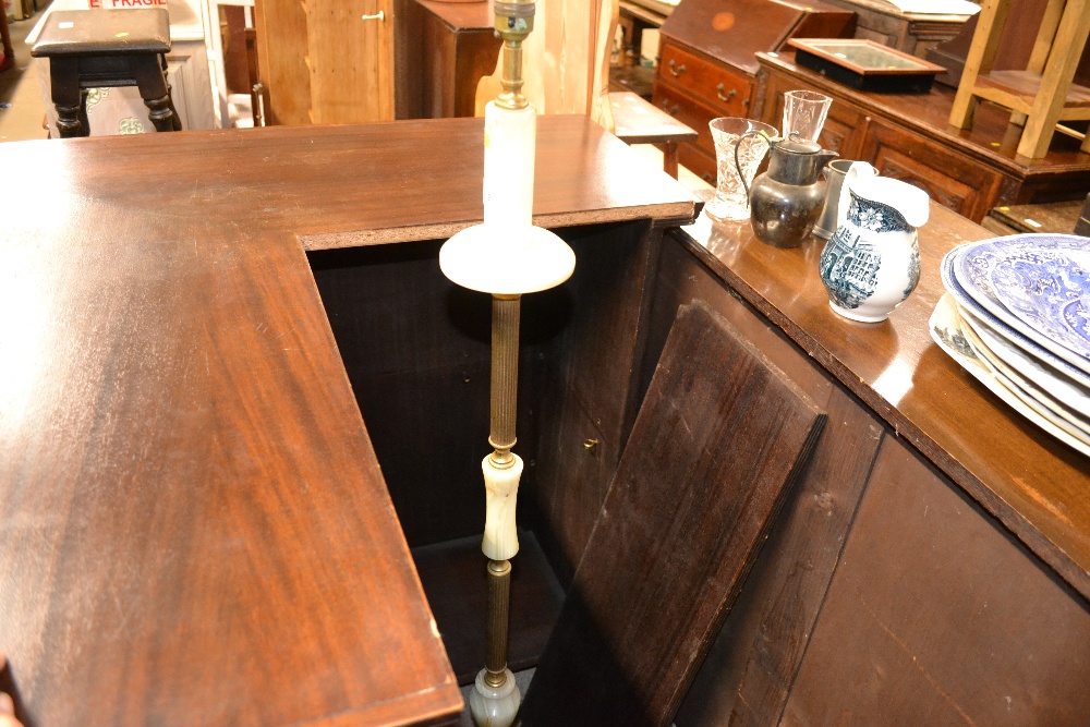 An onyx and brass standard lamp