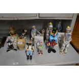 A collection of various clown and other ornaments