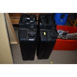 Two black painted jerry cans