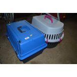 Two plastic pet carriers