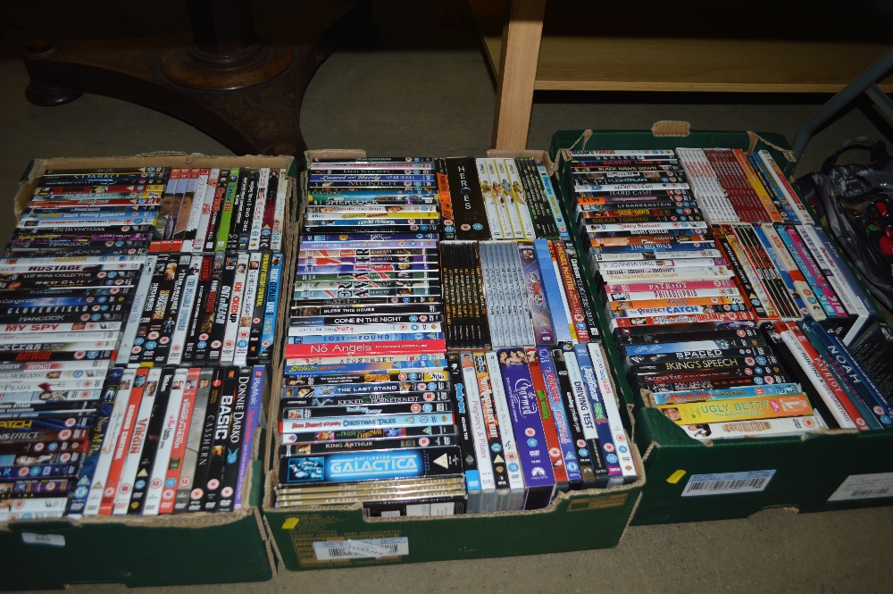 Three boxes of DVDs