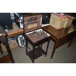 An oak cutlery table with part contents