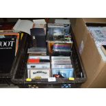 A box of CDs and DVDs